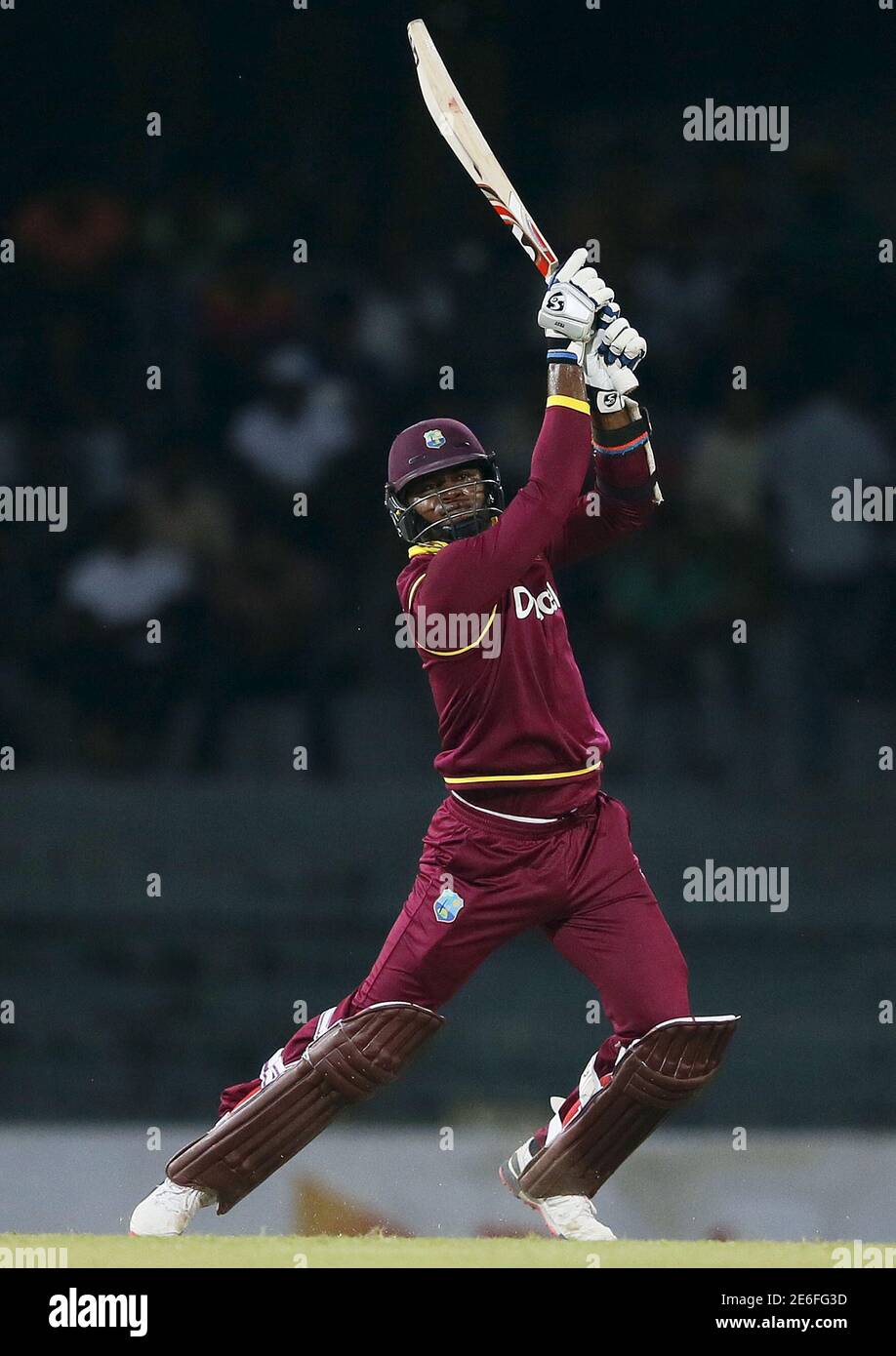 West Indies' Marlon Samuels hits a six during the second One Day International cricket match against Sri Lanka in Colombo November 4, 2015. REUTERS/Dinuka Liyanawatte Stock Photo