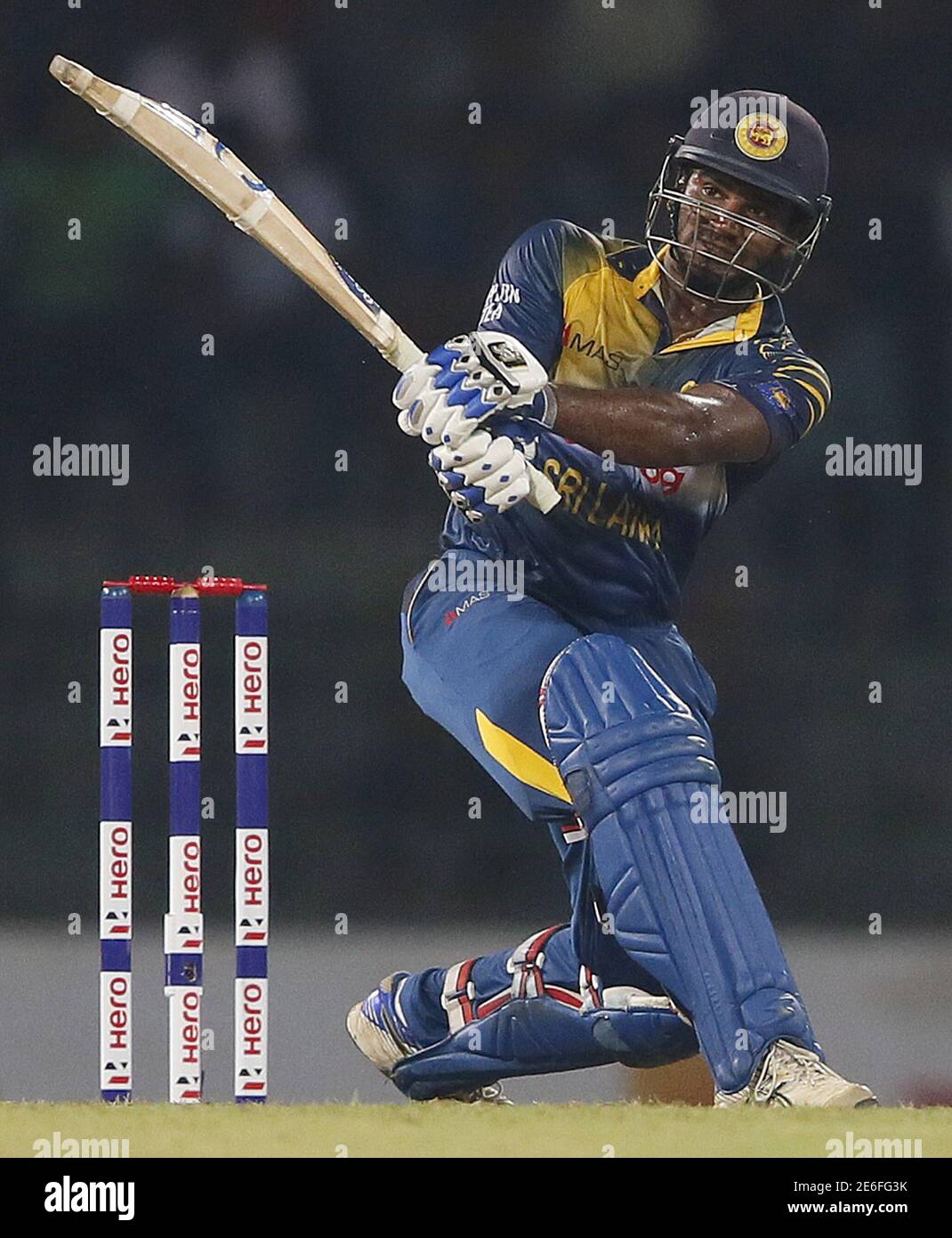 Sri Lanka's Kusal Perera hits a six during the second One Day International cricket match against West Indies in Colombo November 4, 2015. REUTERS/Dinuka Liyanawatte Stock Photo