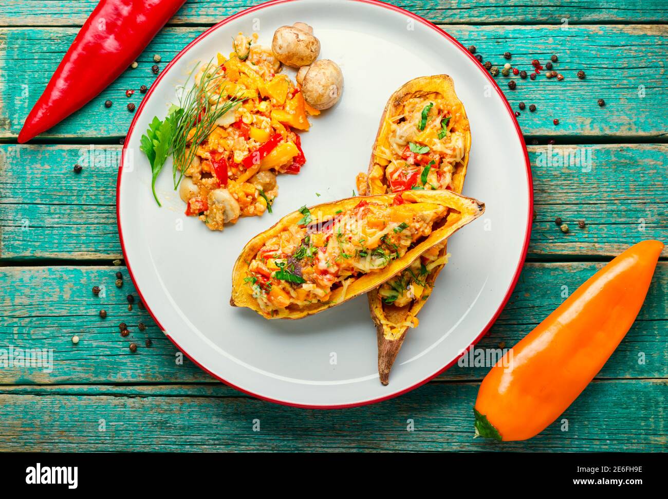 Baked yam with peppers,quinoa and mushrooms.Batata halves stuffed with