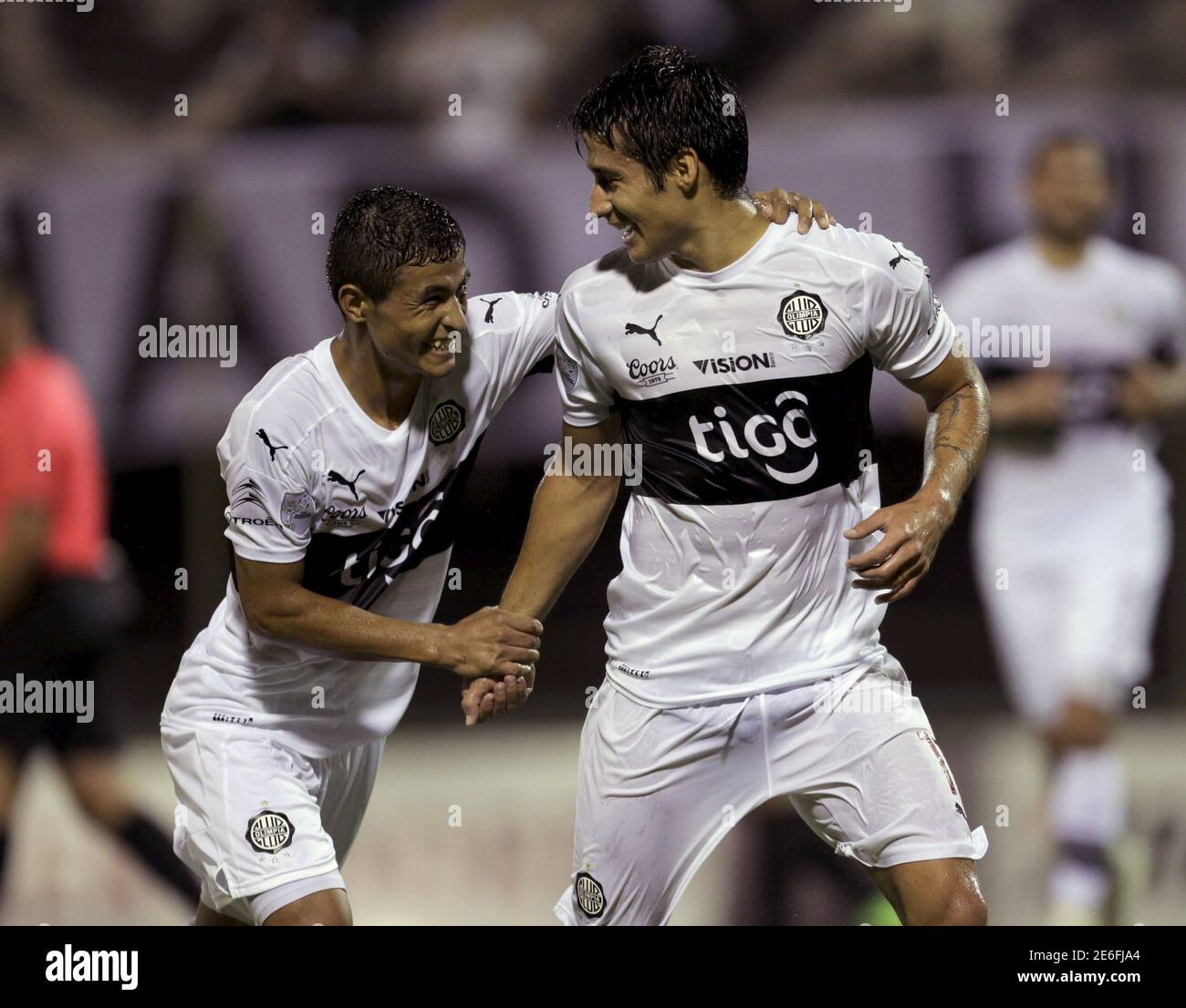 Football Soccer Venezuela S Deportivo Tachira V Paraguay S Olimpia Copa Libertadores Manuel Ferreira Stadium Asuncion Paraguay 13 04 16 Ivan Torres R Of Paraguay S Olimpia Celebrates With His Teammates Rodi Ferreira After Scoring