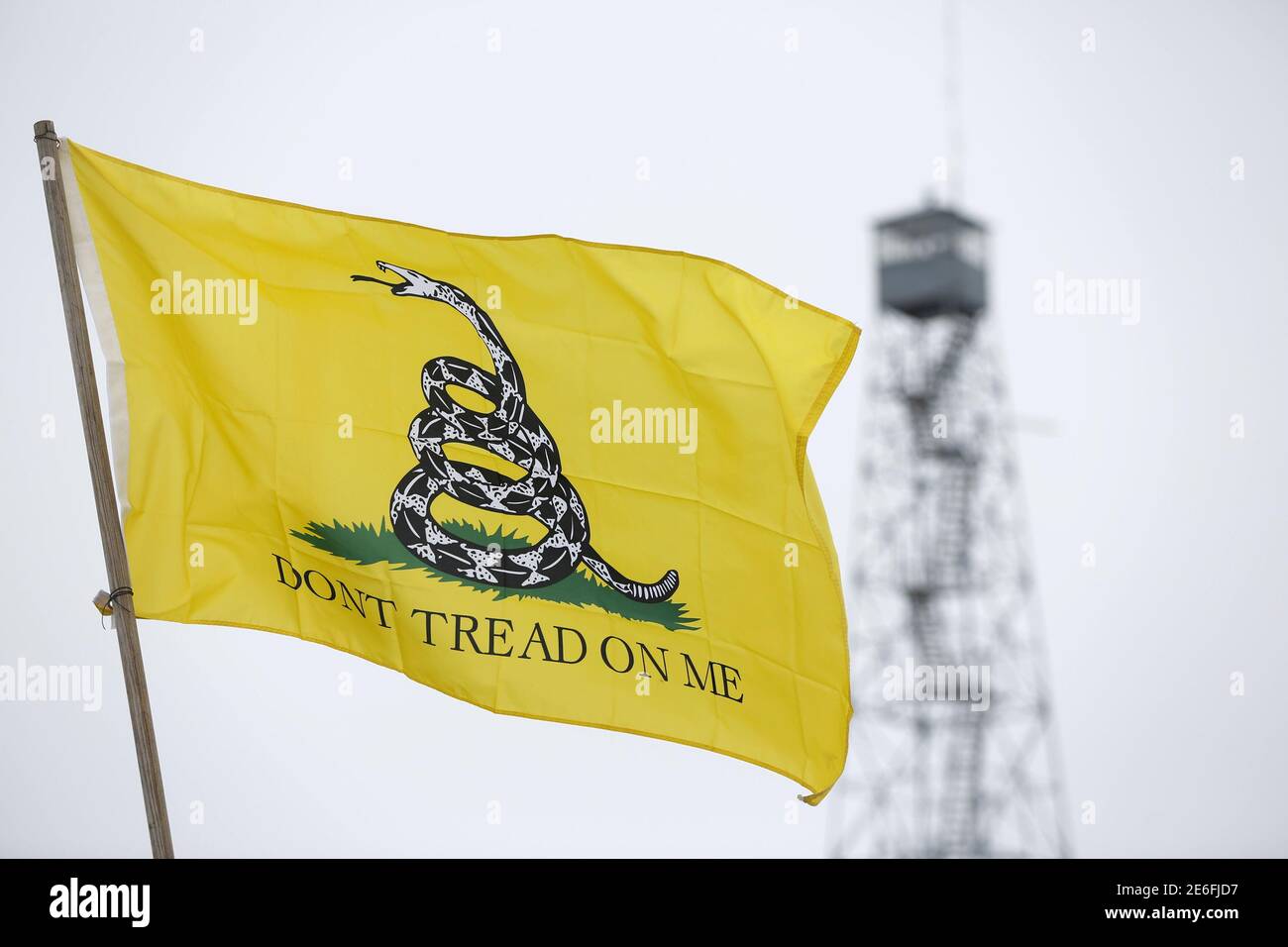 A Gadsden flag flies at the Malheur National Wildlife Refuge near Burns, Oregon, January 10, 2016. Members of self-styled militia groups met on Friday with armed protesters occupying the federal wildlife refuge in Oregon, pledging support for their cause, if not their methods, and offering to act as a peace-keeping force in the week-long standoff over land rights. REUTERS/Jim Urquhart Stock Photo