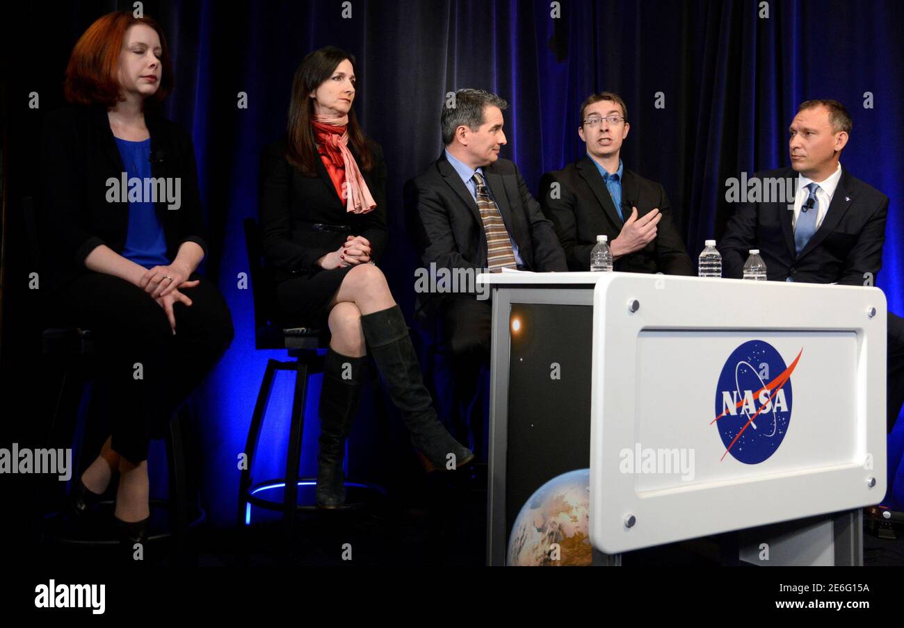 University of Liege (Belgium) astronomer Michael Gillon (2nd,R) makes remarks as (L-R) Space Telescope Science Institute astronomer Nikole Lewis, MIT Professor of planetary science and physics Sara Seager, Sean Carey of NASA's Spitzer Science Center and Associate Administrator for NASA's Science Mission Directorate Thomas Zurbuchen listen during a news conference, to present new findings on exoplanets, planets that orbit stars other than Earth's sun, in Washington, U.S., February 22, 2017. REUTERS/Mike Theiler Stock Photo