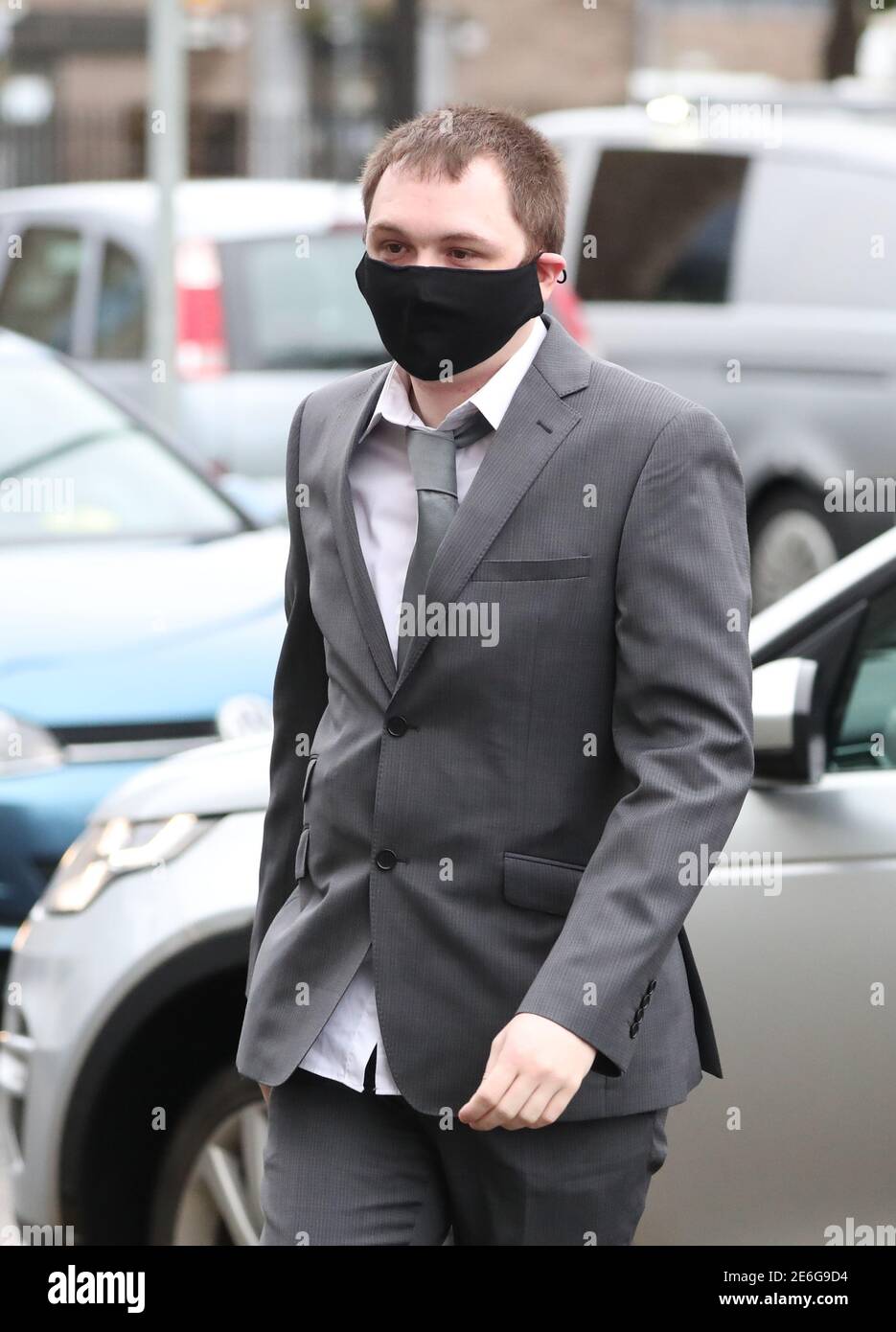 Porter Christopher O'Malley arrives at Dumbarton Sheriff Court ahead of