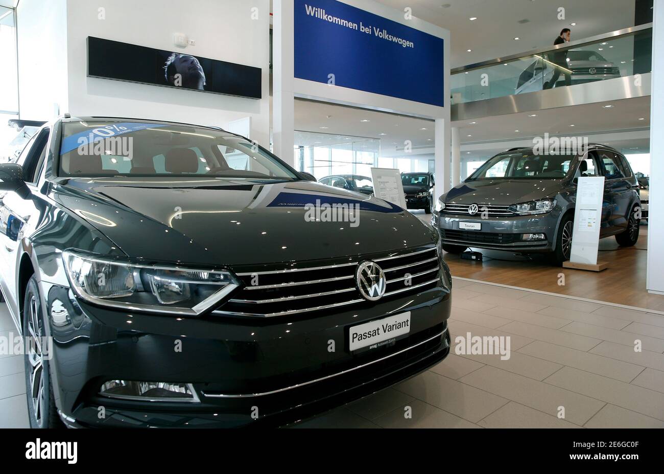 The logo of German carmaker Volkswagen is seen on a Volkswagen Passat car  at a showroom of Swiss car importer AMAG in Duebendorf, Switzerland  February 12, 2016. REUTERS/Arnd Wiegmann Stock Photo - Alamy