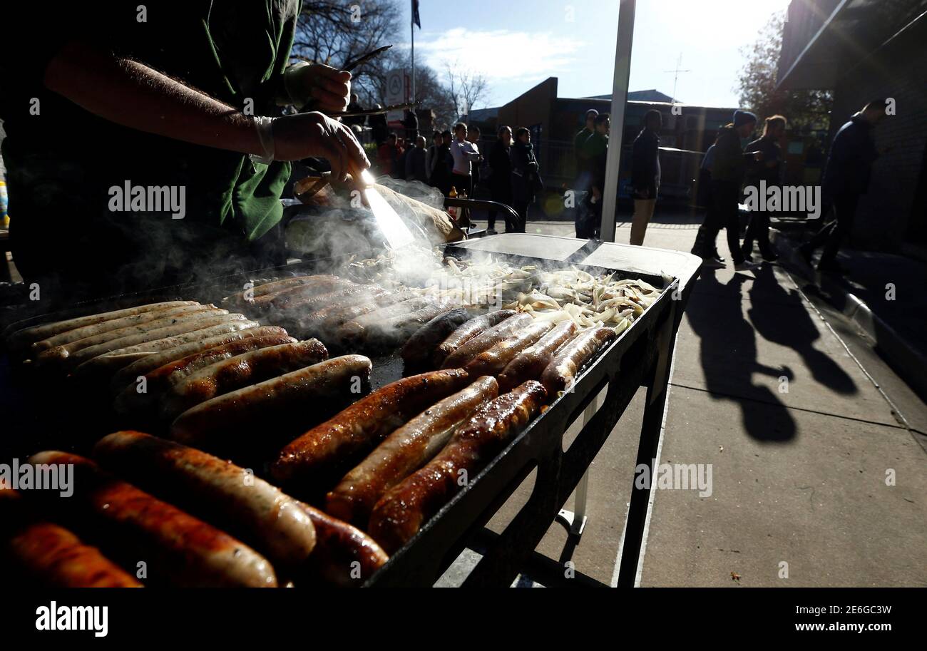 Australian Sausage Sizzle Hi Res Stock Photography And Images Alamy A Traditional Australian Sausage Sizzle Barbeque Offers Sausage And Onion Sandwiches To Hungry Voters As They Queue Up At A Polling Station At Mount Alexander College In Flemington Melbourne July 2 2016 On Australias Federal Election Day Reed 2E6GC3W 