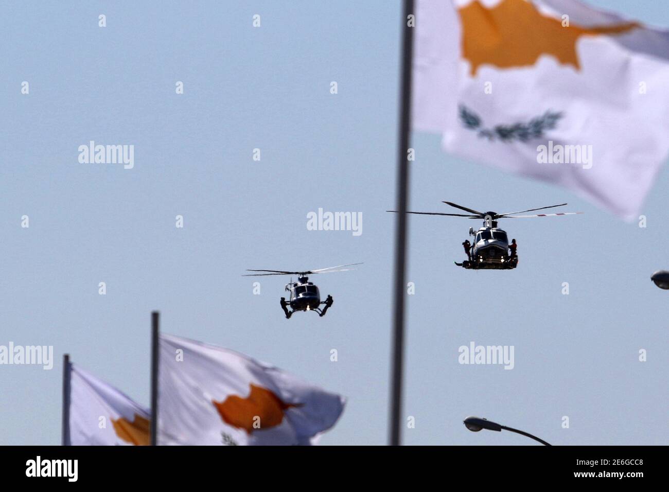 Helicopters participate in a military parade marking Cyprus' Independence Day in Nicosia, Cyprus October 1, 2016. REUTERS/Yiannis Kourtoglou Stock Photo