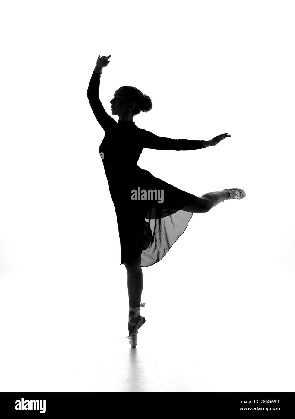 Ballet dancer in silhouette Stock Photo