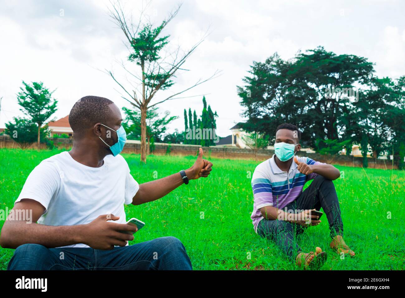 Black men wearing masks hi-res stock photography and images - Alamy