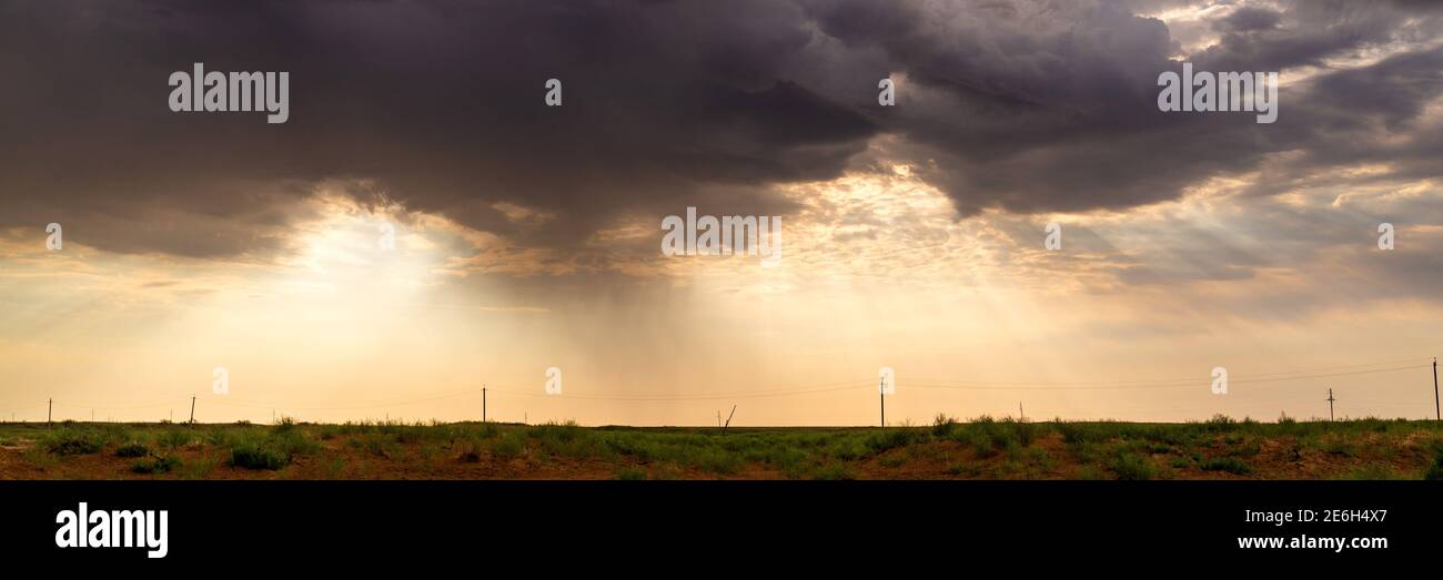 Dramatic stormy sky in desert before thunderstorm. Stock Photo
