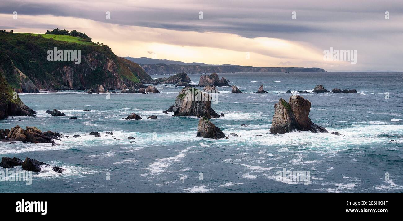 Detail of west view of Playa del Silencio, in Asturias, Spain, just at sunset after a storm Stock Photo