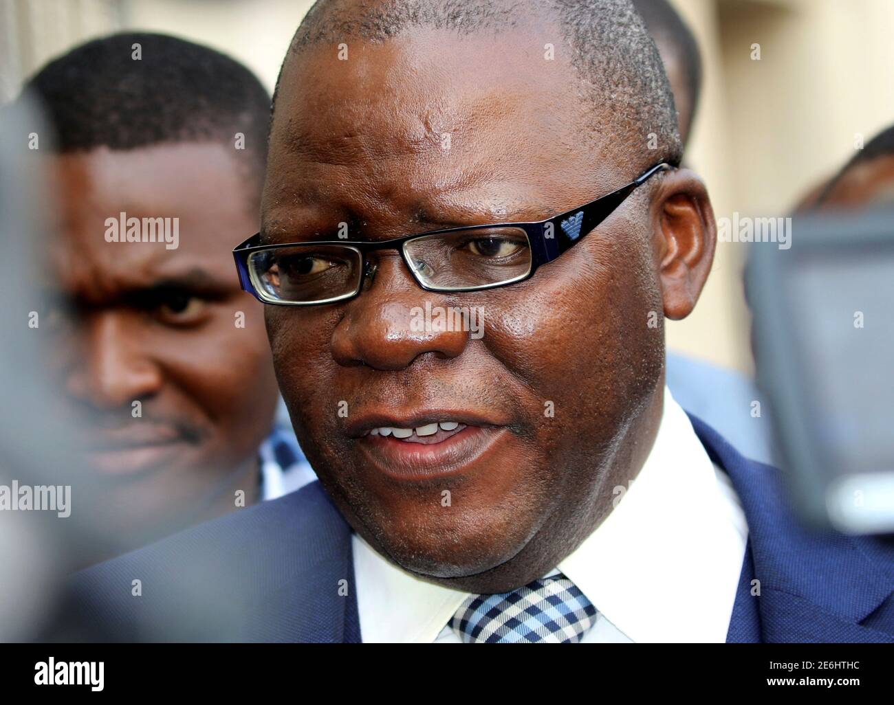 Lawyer Tendai Biti, former finance minister, speaks to journalits after a two-week ban on public protests issued by the police was struck down, outside Zimbabwe's High Court in the capital Harare, September 7, 2016. REUTERS/Philimon Bulawayo Stock Photo