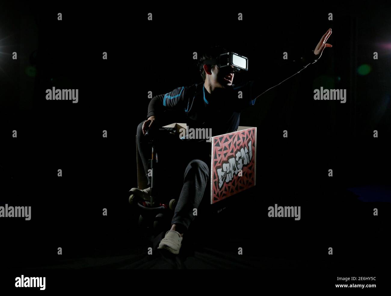 Tomohiro Hamamura 25 Who Works In It Sales And Is A Hado Kart Player Poses For A Photograph Wearing A Head Mount Display And An Armband Sensor In Tokyo Japan March 18 17