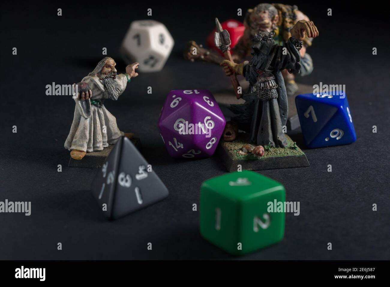 Dungeons and Dragons dice and hand painted lead figures produced by Games Workshop in 1983 as accessories to the game Stock Photo