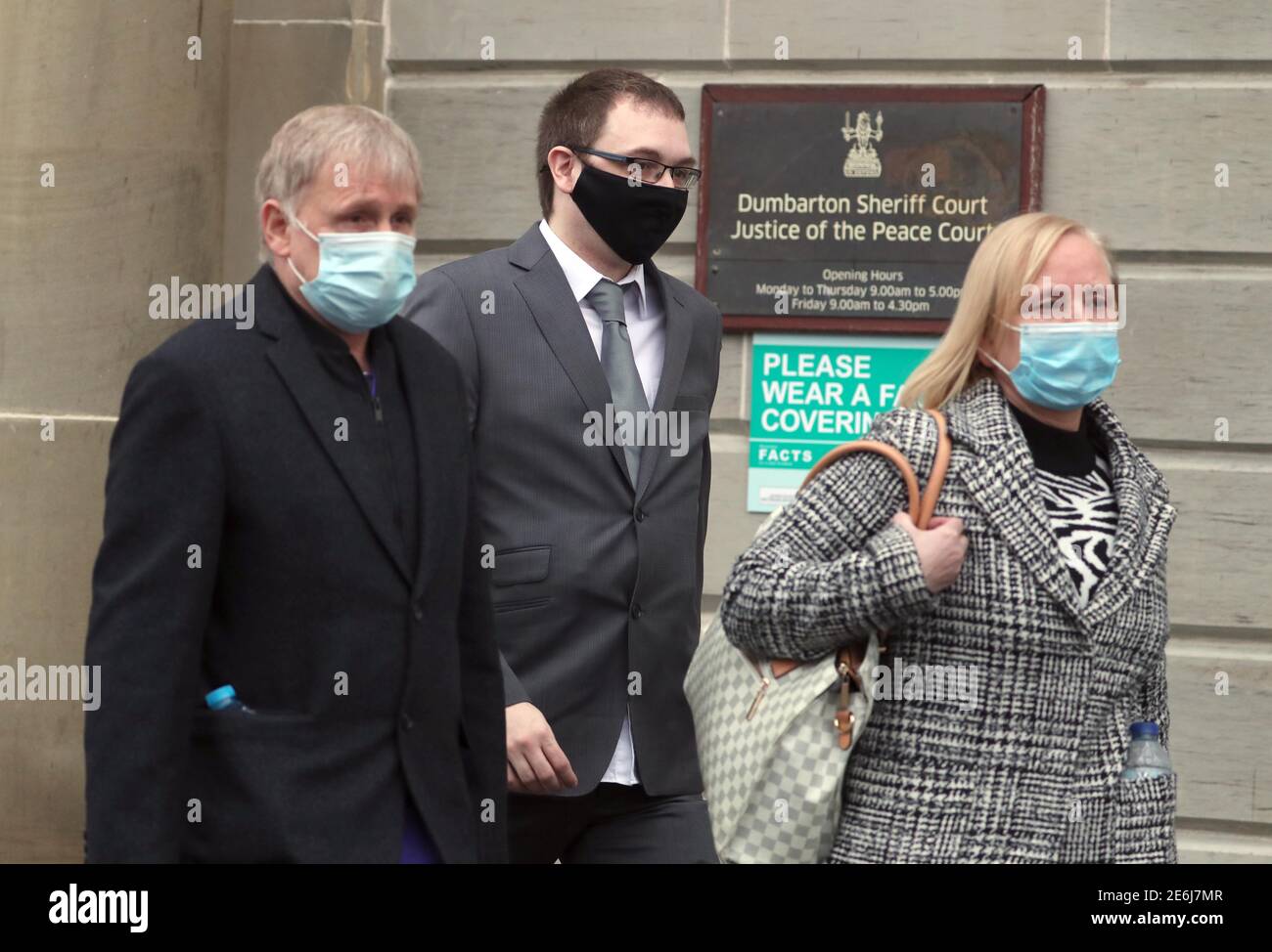 Christopher O'Malley (centre) leaving Dumbarton Sheriff Court after he
