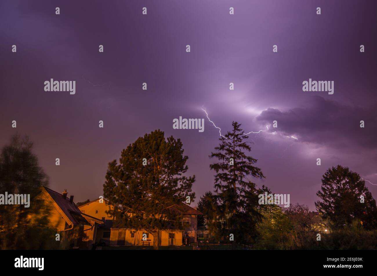 small lightning in the night in a village Stock Photo
