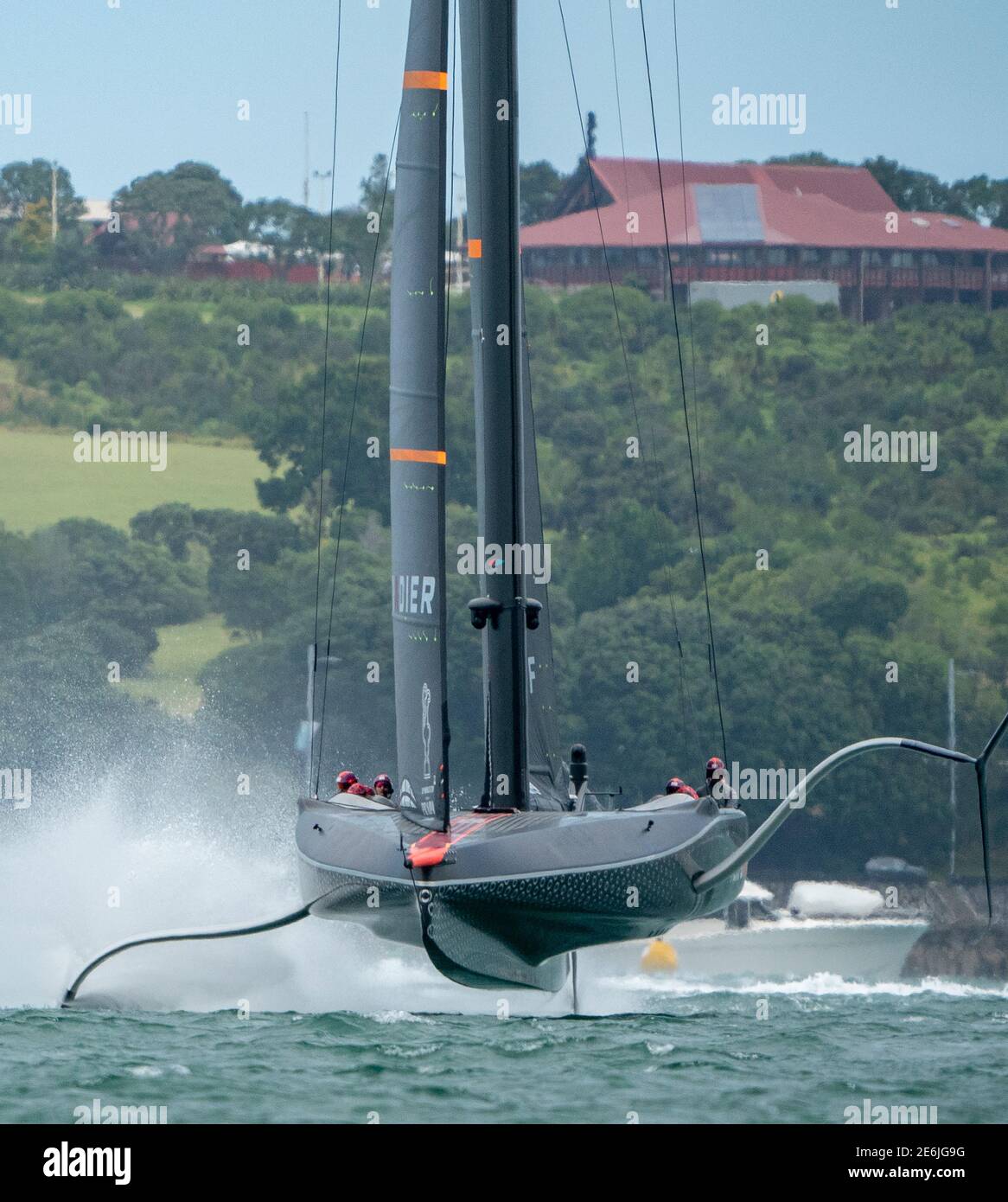 Auckland, New Zealand, 29 January, 2021 -  Sir Ben Ainslie, on the helm of INEOS Team UK's Britannia (right) as the team practice on the Waitemata Harbour ahead of the Prada Cup finals which start on February 12. They will race either Italian team Luna Rossa Prada Pirelli or New York Yacht Club American Magic who are currently competing in the semi-finals which started today. Credit: Rob Taggart/Alamy News Live Stock Photo