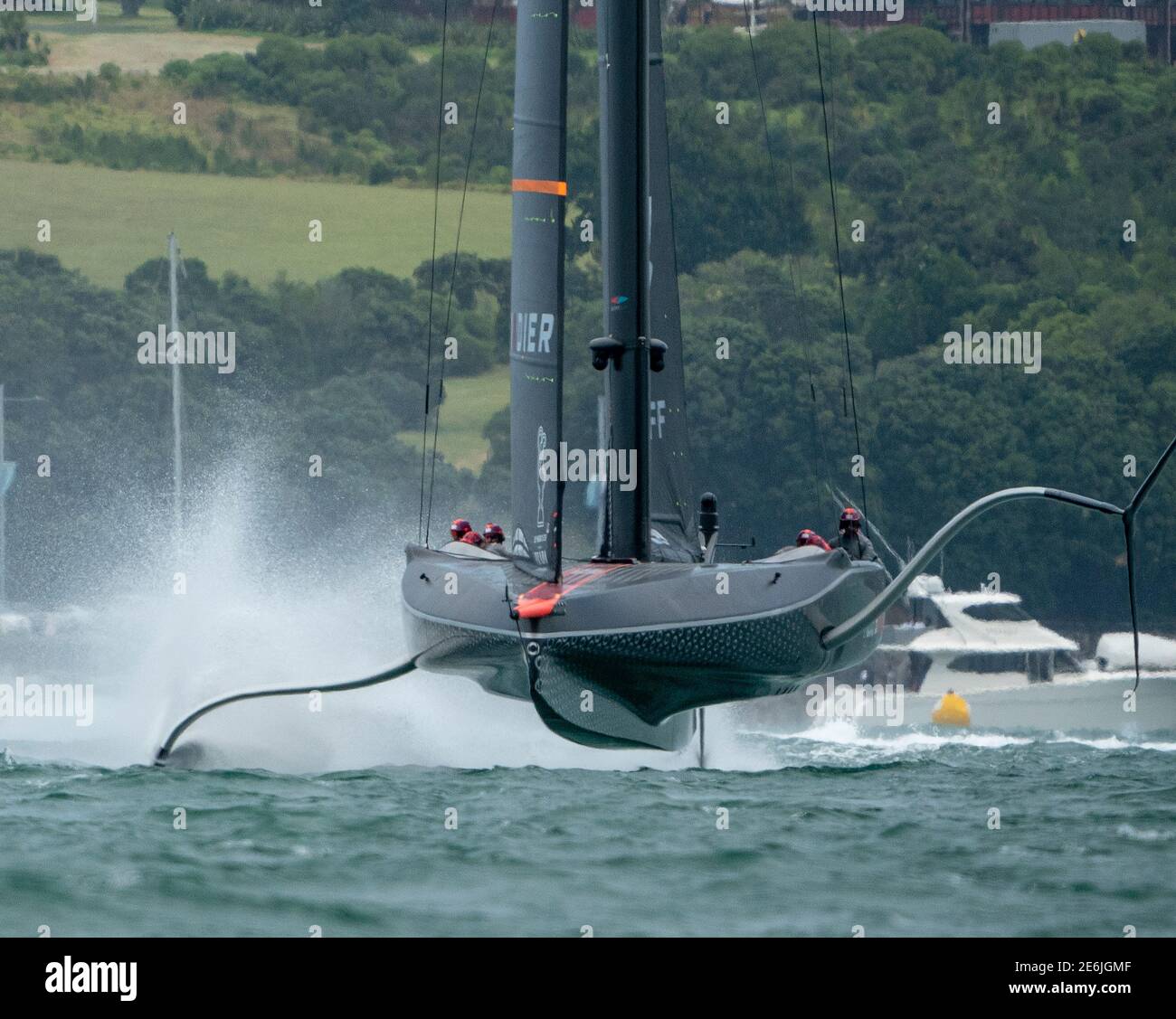Auckland, New Zealand, 29 January, 2021 -  Sir Ben Ainslie, on the helm of INEOS Team UK's Britannia (right) as the team practice on the Waitemata Harbour ahead of the Prada Cup finals which start on February 12. They will race either Italian team Luna Rossa Prada Pirelli or New York Yacht Club American Magic who are currently competing in the semi-finals which started today. Credit: Rob Taggart/Alamy News Live Stock Photo