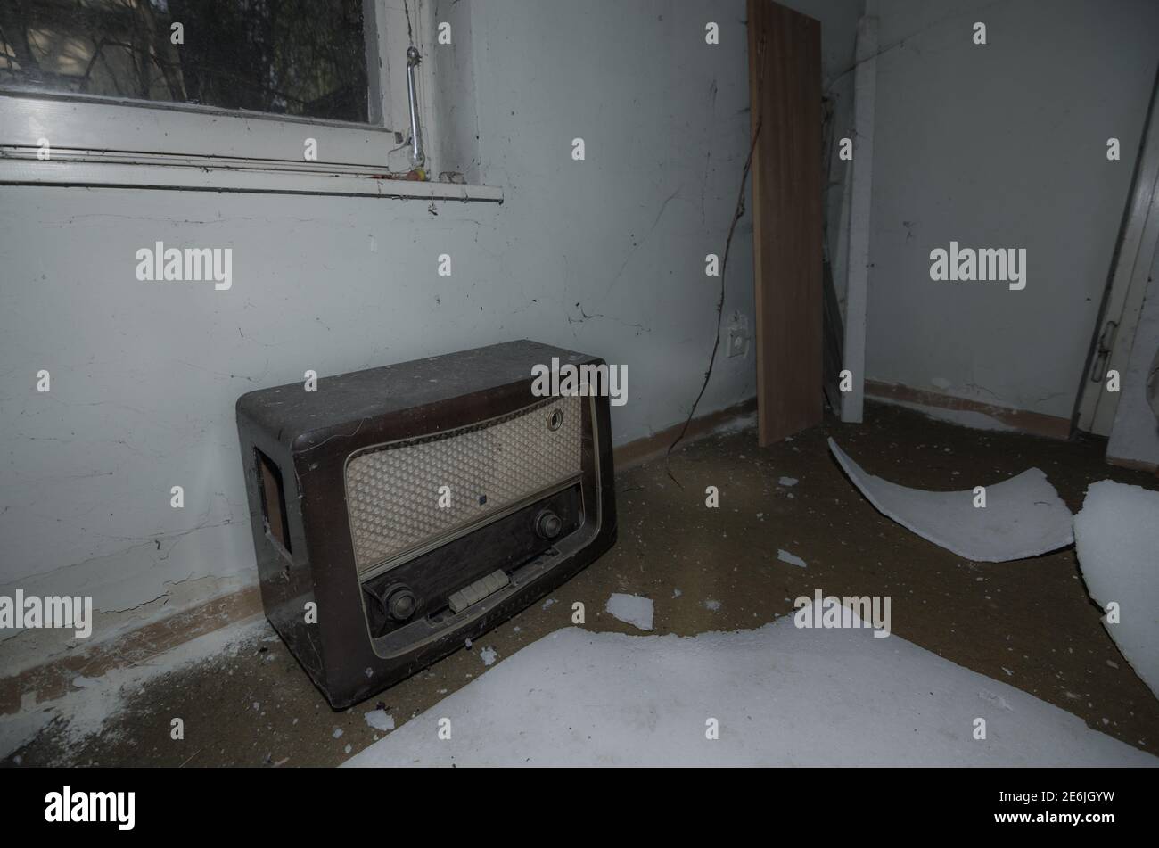 old television on the ground from the house Stock Photo