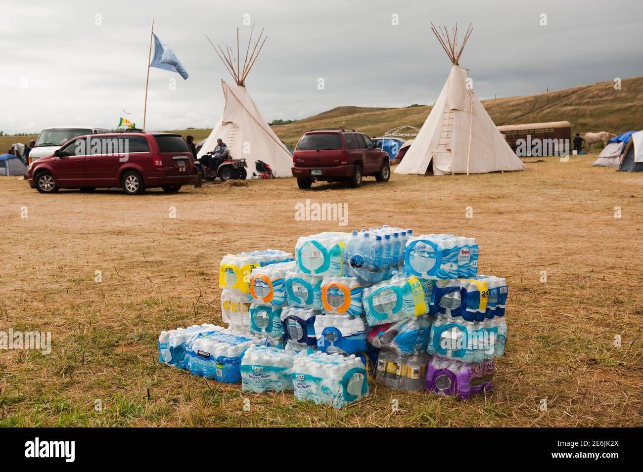 Cases of water bottles are stacked around an encampment where hundreds of protestors have gathered on the banks of the Cannon Ball River to stop construction of the Energy Transfer Partners' Dakota Access oil pipeline near the Standing Rock Sioux reservation in Cannon Ball, North Dakota, U.S.. September 7, 2016.   REUTERS/Andrew Cullen Stock Photo