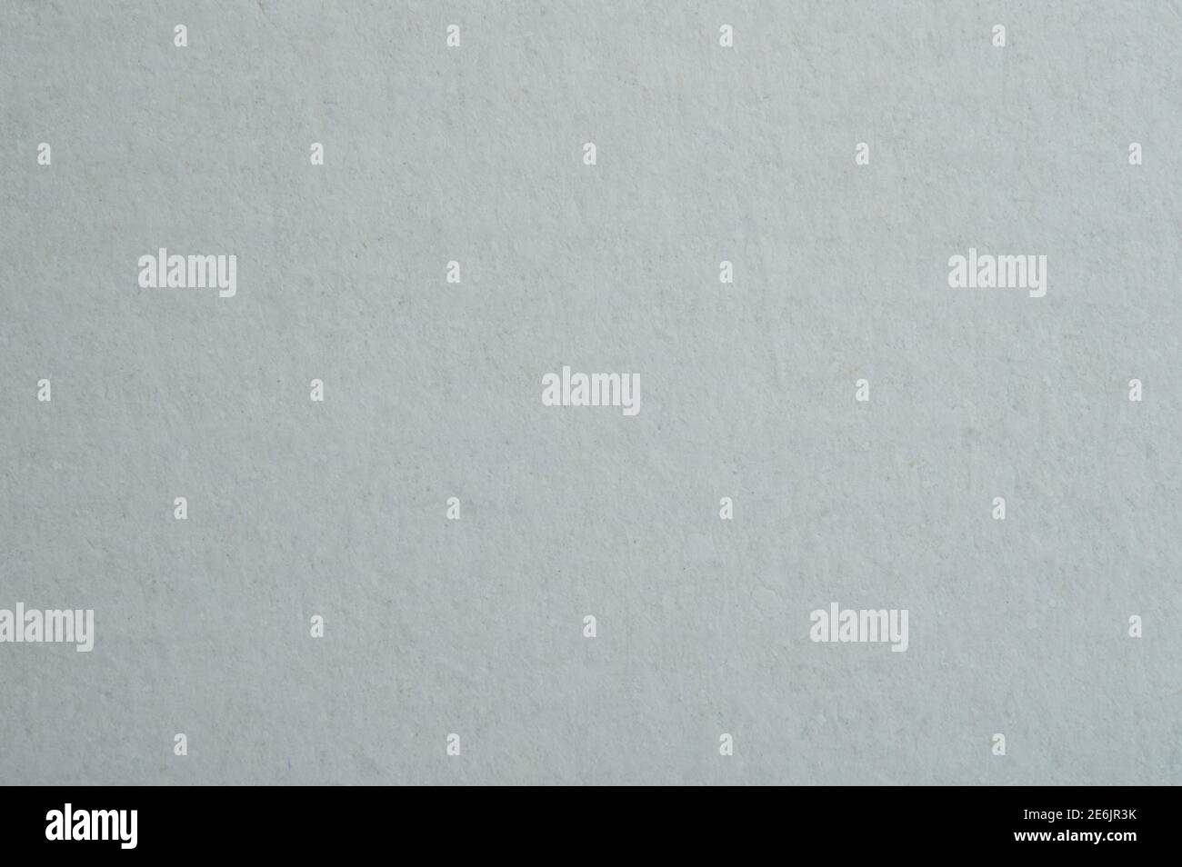Grey rough paper background macro close up view Stock Photo