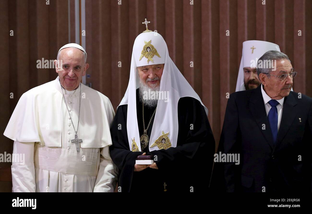 pope-francis-l-russian-orthodox-patriarch-kirill-c-and-cubas-president-raul-castro-stand-together-in-havana-february-12-2016-reutersalejandro-ernestopool-2E6JRG6.jpg
