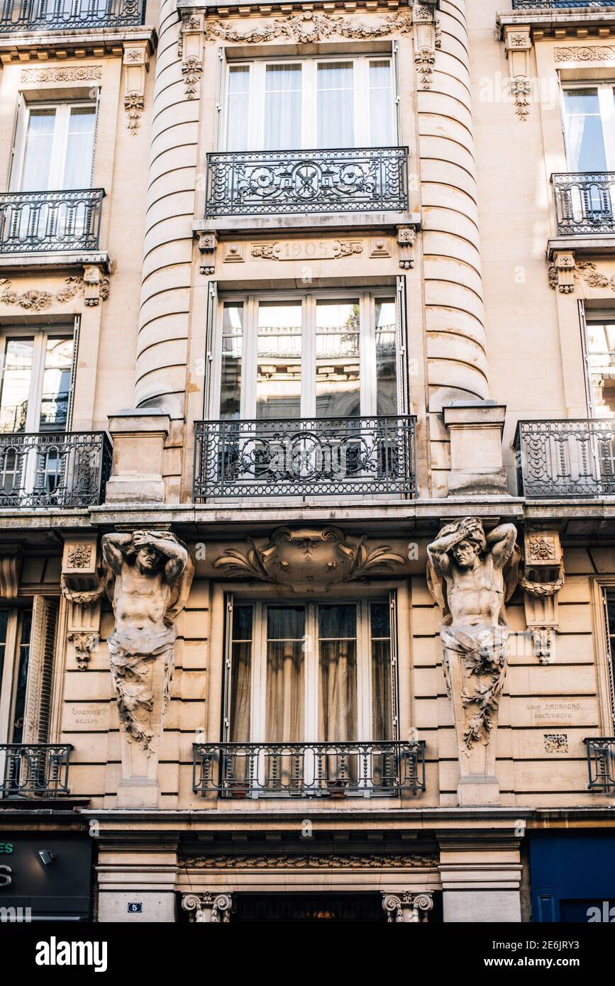 building facade with balconies and wide windows Stock Photo - Alamy