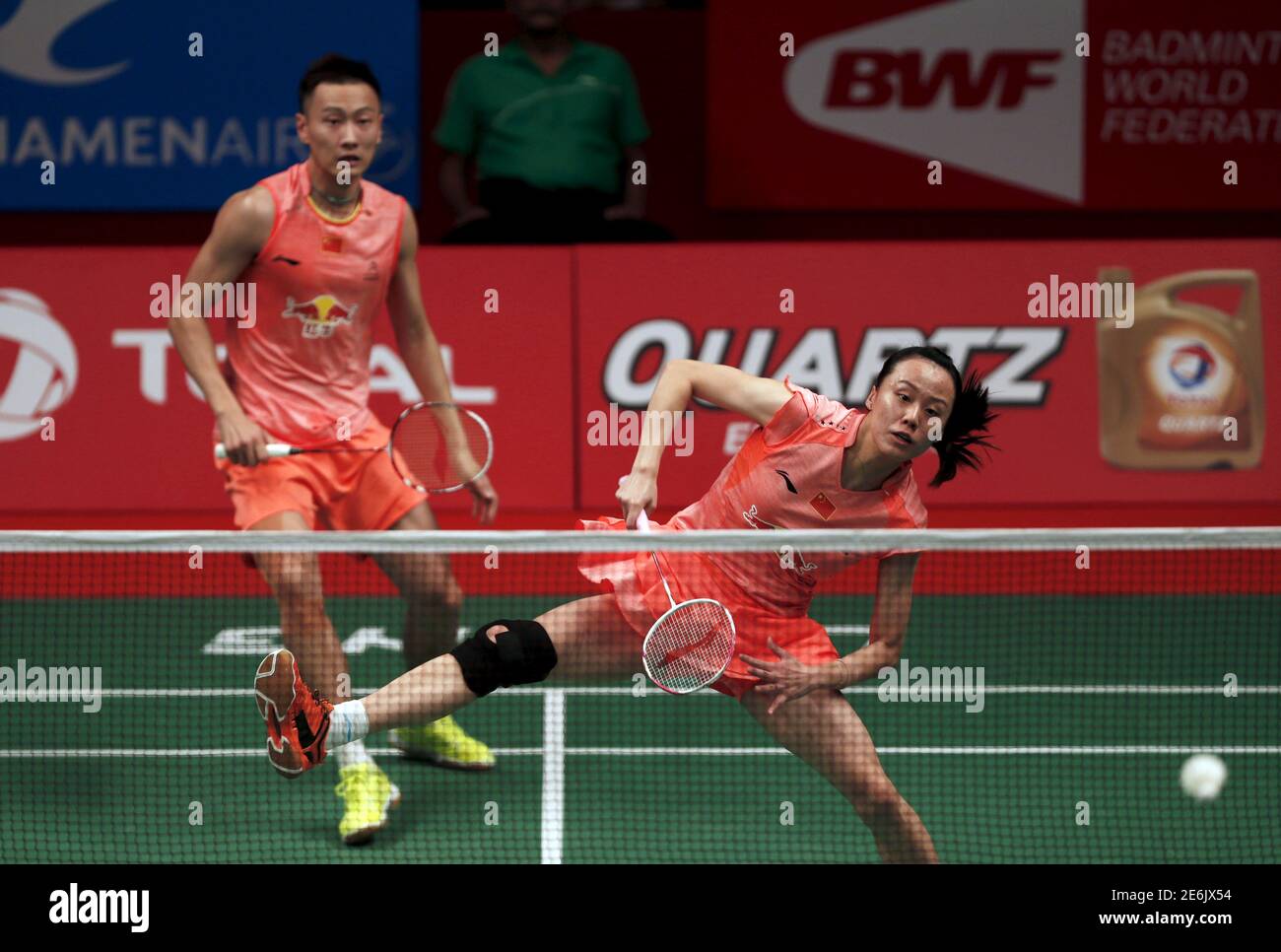 China's Zhang Nan (L) and Zhao Yunlei hit a return to Indonesia's Tontowi  Ahmad and Liliyana Natsir during their semi-final mixed doubles badminton  match at the BWF World Championship in Jakarta, August
