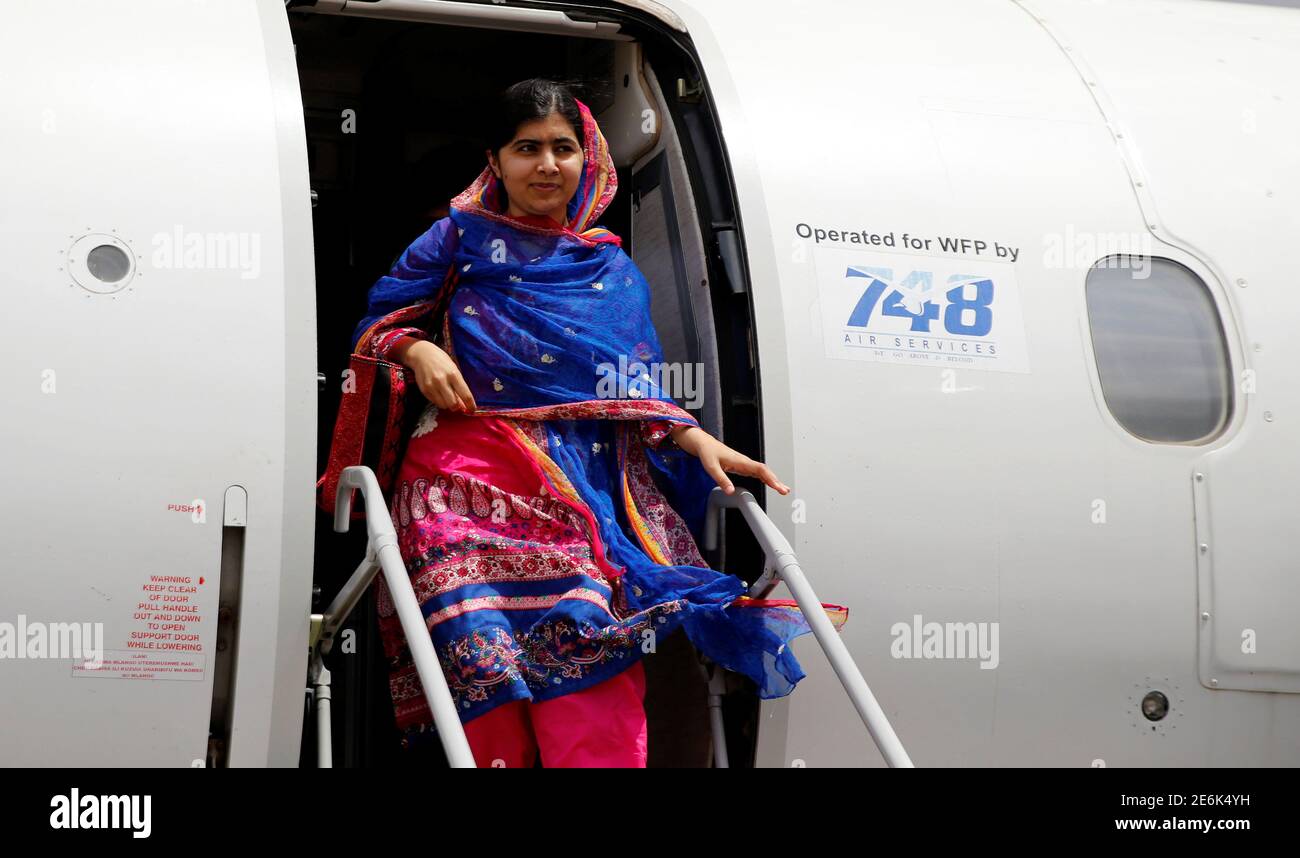 Pakistani Nobel Peace Prize laureate Malala Yousafzai disembarks from a plane as she arrives to celebrate her 19th birthday at the Dadaab refugee camp near the Kenya-Somalia border, July 12, 2016. REUTERS/Thomas Mukoya Stock Photo