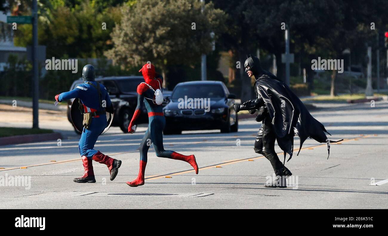 People Dressed Like Comic Book Characters Captain America Spider Man And Batman Run Across The Street In Pasadena California U S August 27 16 Picture Taken August 27 16 Reuters Mario Anzuoni Stock Photo Alamy