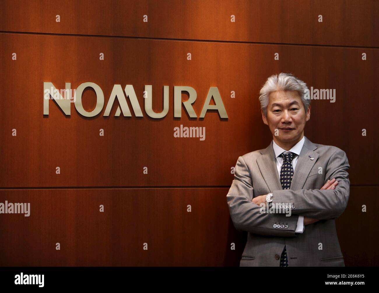Nomura Holdings Chief Executive Officer Koji Nagai Poses For Pictures After An Interview With Reuters In Tokyo Japan February 9 16 Nomura Holdings Inc Plans A Shift In Focus In The United