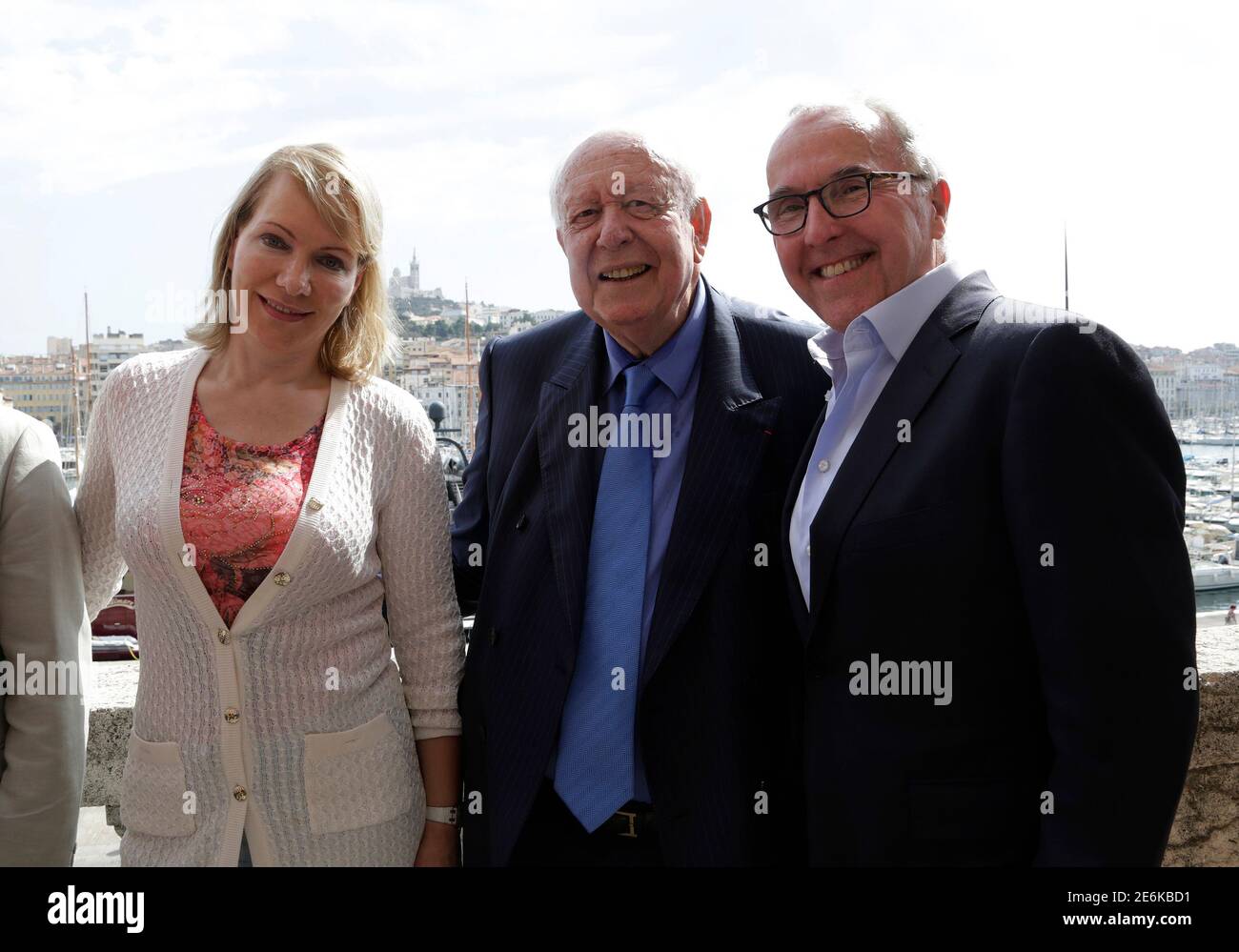 Marseille's mayor Jean-Claude Gaudin (C), Olympique de Marseille's majority  owner, billionaire businesswoman Margarita Louis-Dreyfus (L) and Frank  McCourt, former owner of the Los Angeles Dodgers baseball team, pose after  they attend a