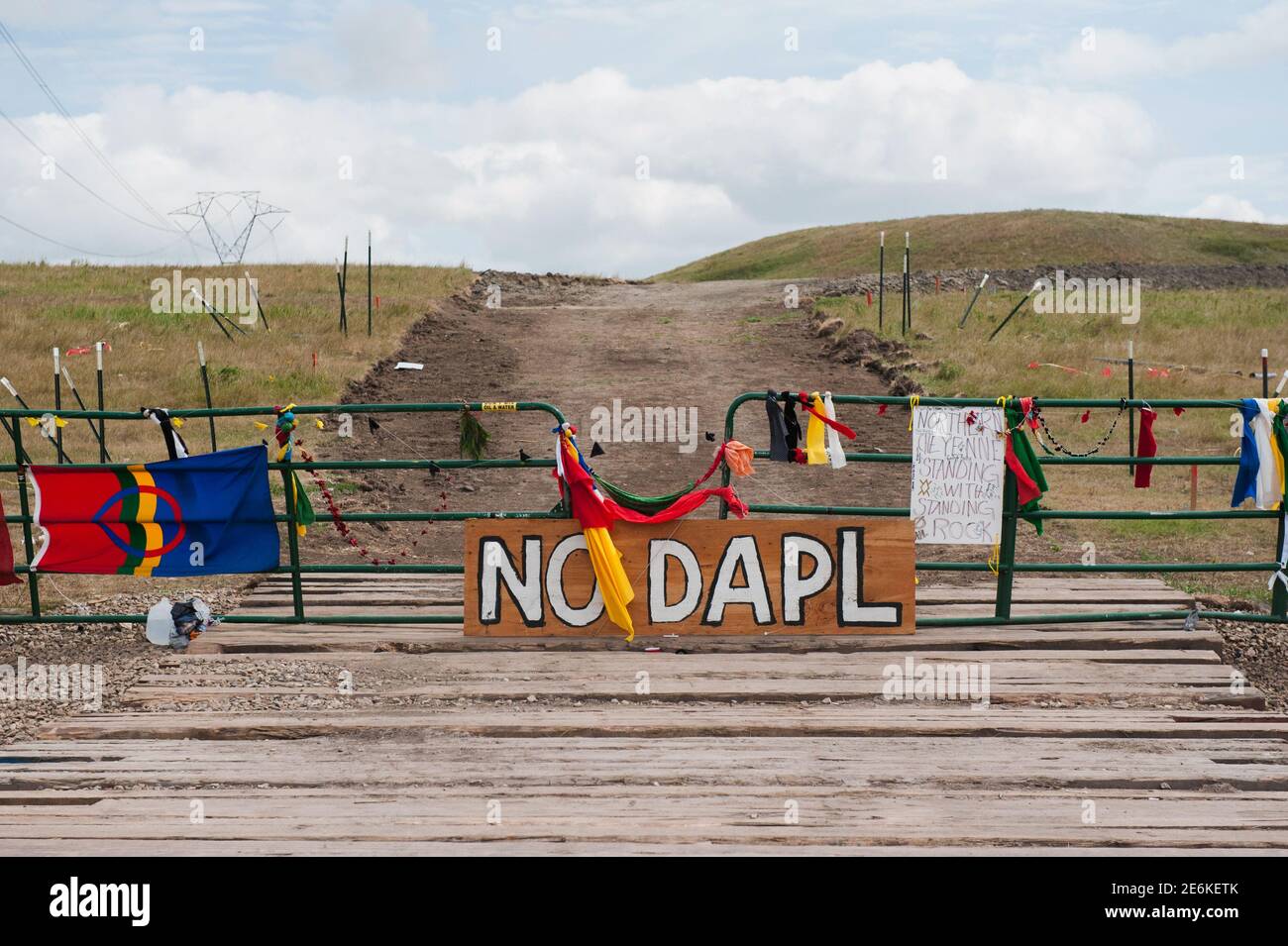 Signs left by protesters demonstrating against the Energy Transfer Partners Dakota Access oil pipeline sit at the gate of a construction access road where construction has been stopped for several weeks due to the protests near the Standing Rock Sioux reservation in Cannon Ball, North Dakota, U.S. September 6, 2016.  REUTERS/Andrew Cullen Stock Photo