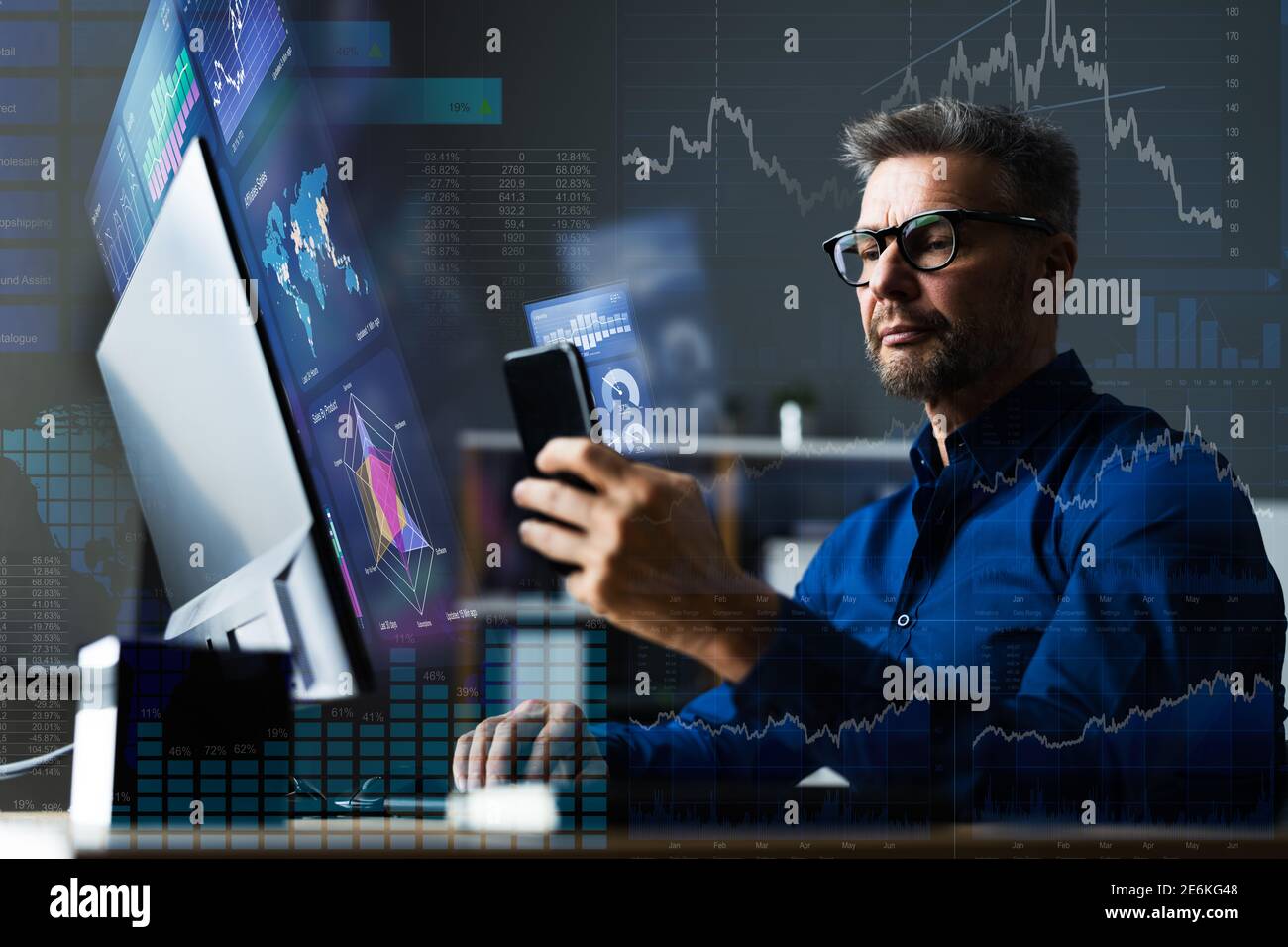Financial Data Analyst Using Mobile Analytics On Smartphone Stock Photo