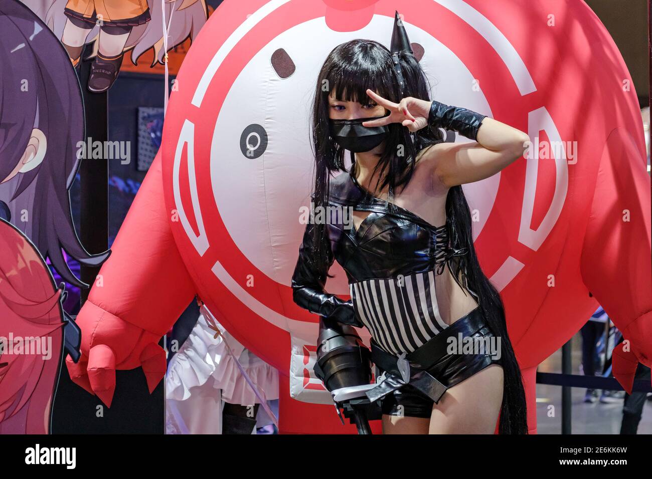 A cosplay model poses for a photo during the Taipei Game Show at Nangang Exhibition Center in Taipei.Taipei Game Show, held by Taipei Computer Association (TCA), is the only game exhibition, which combines B2B and B2C zone. From 2003, it attracts tons of gamers from all over the world because of the special and amazing content. B2B ZONE divides into “B2B ZONE” and “Indie House”. The former one focuses on game developers, publishers, third-party payment and advertisers, the latter one gathers global indie teams to share and merchandise their game IPs. Also, B2B ZONE set up an online business ma Stock Photo