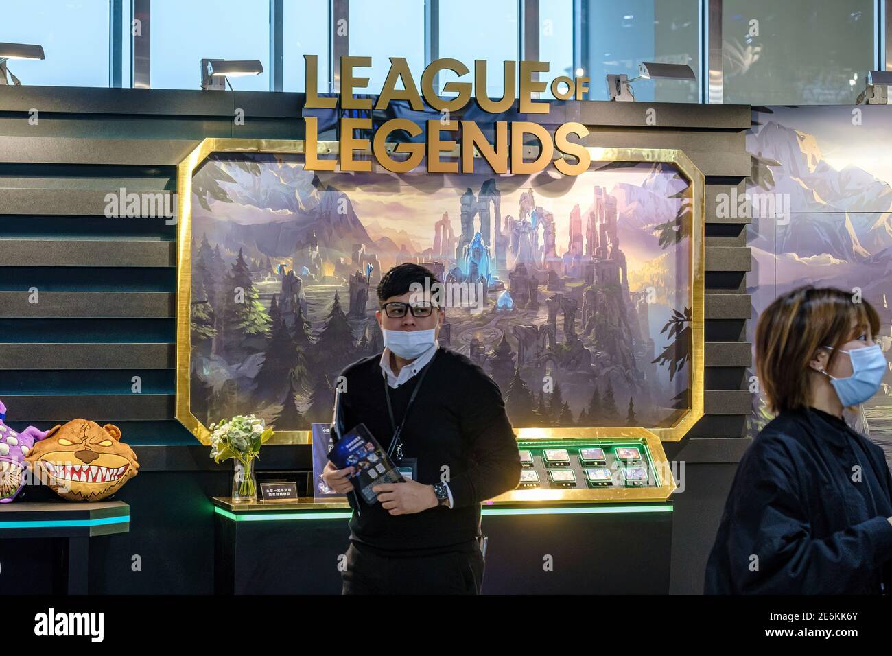 A man wearing a mask stands in front of League of Legends (LOL) stand during the Taipei Game Show at Nangang Exhibition Center in Taipei.Taipei Game Show, held by Taipei Computer Association (TCA), is the only game exhibition, which combines B2B and B2C zone. From 2003, it attracts tons of gamers from all over the world because of the special and amazing content. B2B ZONE divides into “B2B ZONE” and “Indie House”. The former one focuses on game developers, publishers, third-party payment and advertisers, the latter one gathers global indie teams to share and merchandise their game IPs. Also, B Stock Photo