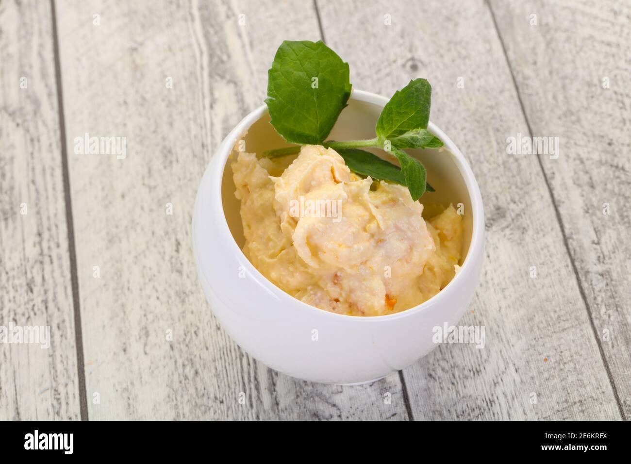 Curd with dry apricot served mint leaves Stock Photo Alamy