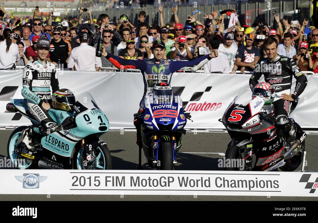 New World Champions In Their Categories Yamaha Motogp Rider Jorge Lorenzo C Of Spain Kalex Moto2 Rider Johann Zarco Of France R And Honda Moto3 Rider Danny Kent Of Britain Pose After