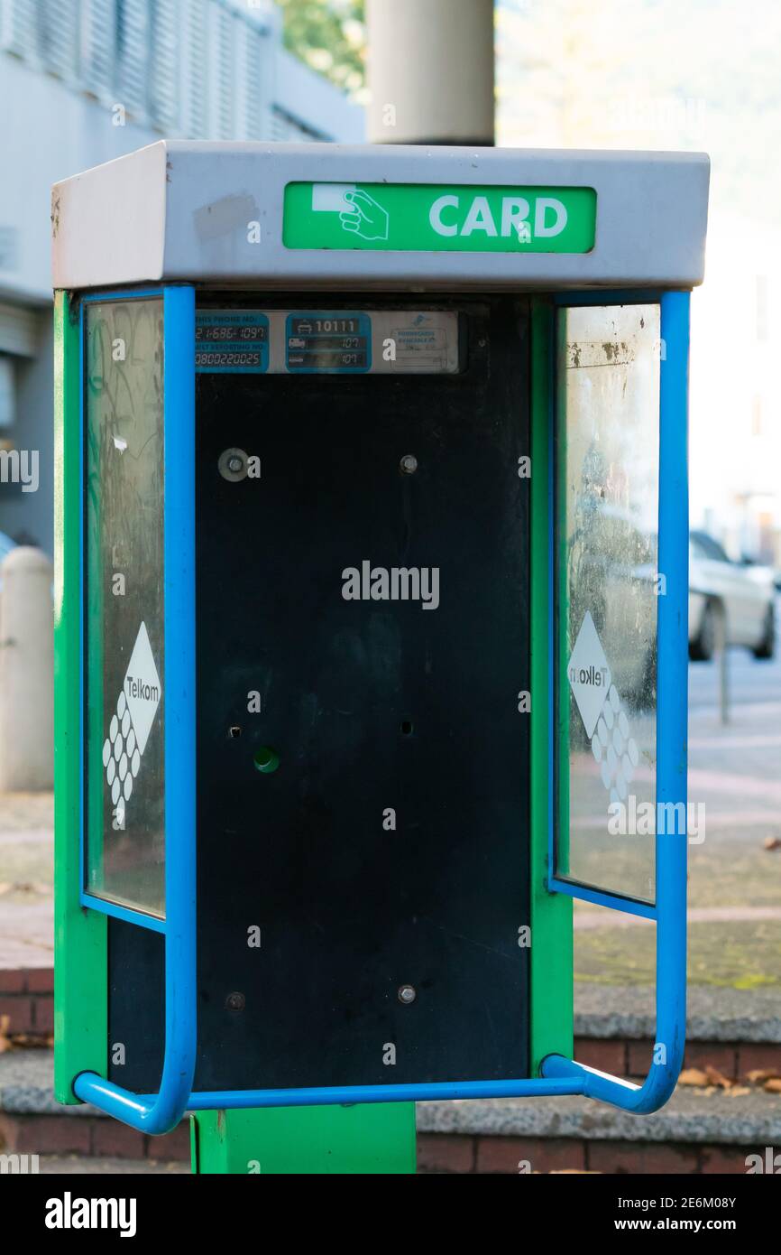 Telkom phone box or booth which has been vandalised and is empty with no phone in Cape Town South Africa Stock Photo