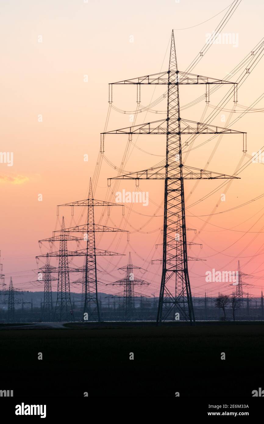 Electricity pylons and electric power transmission lines against ...