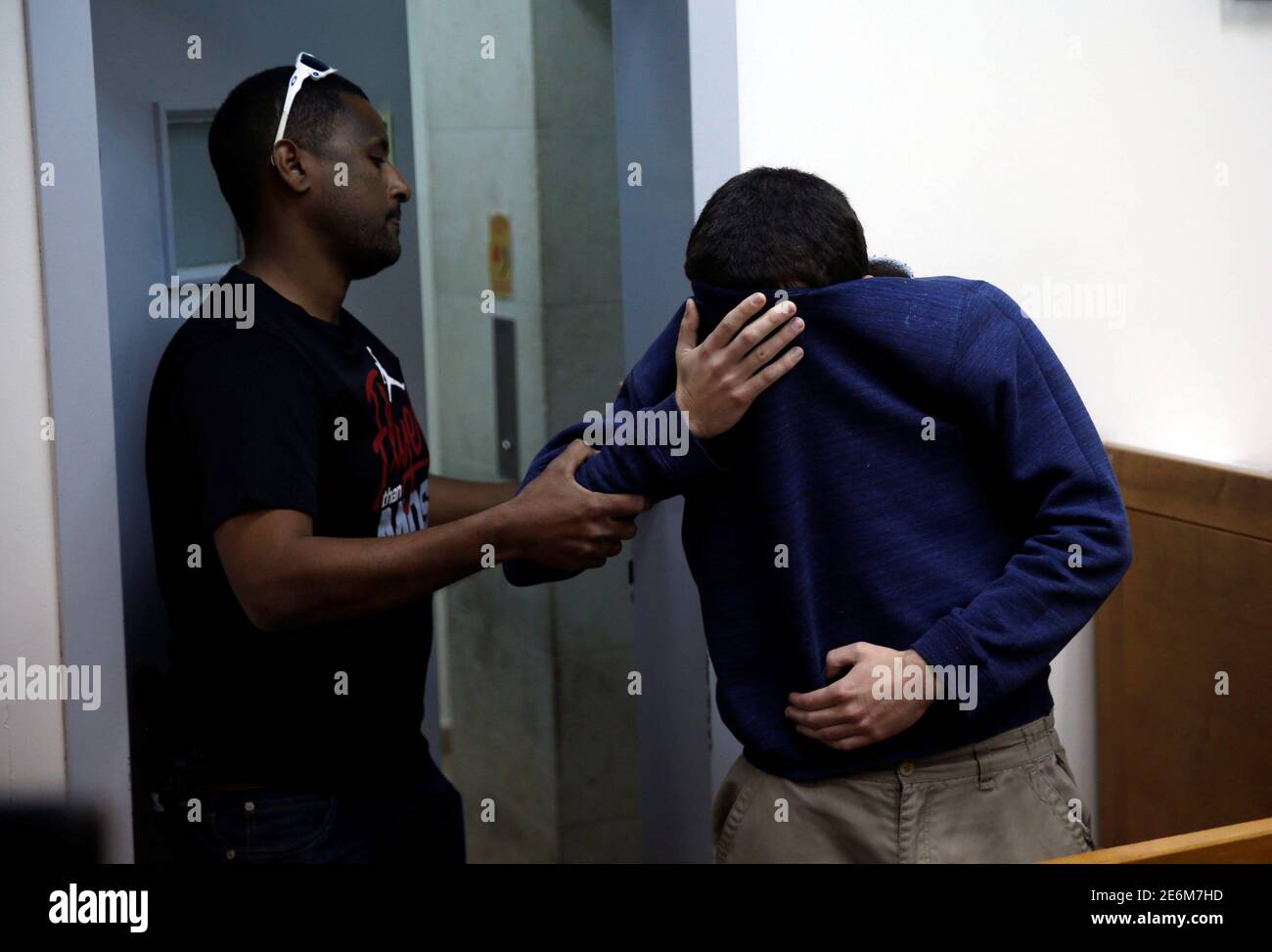 An U.S.-Israeli teen who was arrested in Israel on suspicion of making bomb threats against Jewish community centres in the United States, Australia and New Zealand over the past three month, is seen before the start of a remand hearing at Magistrate's Court in Rishon Lezion, Israel March 23, 2017. REUTERS/Baz Ratner Stock Photo