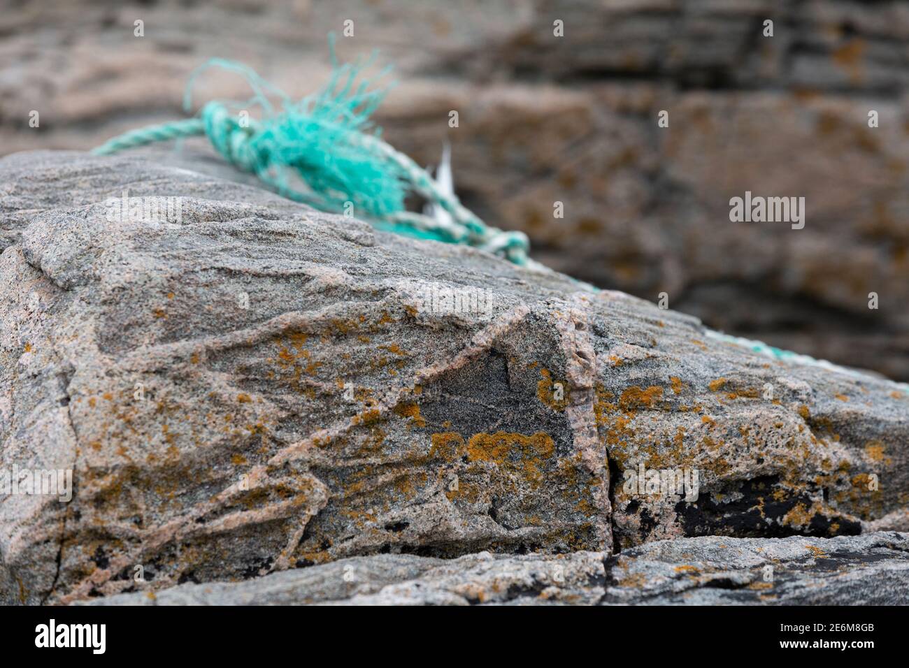 Washed up ragged rope on a cliff near Lindesnes, Norway Stock Photo - Alamy