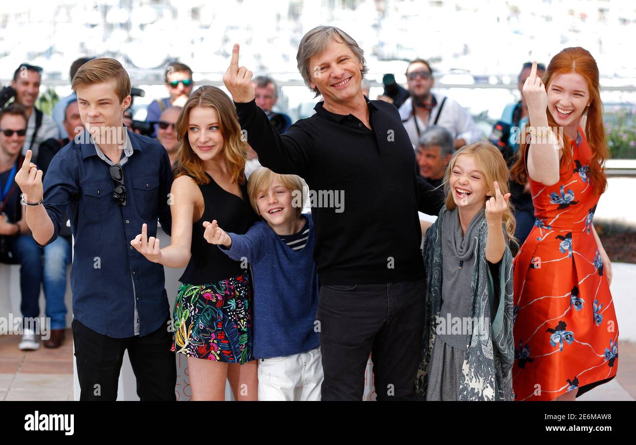 L-R) Cast members Nicholas Hamilton, Samantha Isler, Charlie Shotwell,  Viggo Mortensen, Shree Crooks and Annalise Basso gesture during a photocall  for the film "Captain Fantastic" in competition for the category "Un Certain