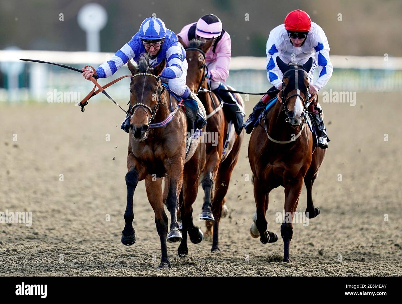 Lucky Ava ridden by Martin Dwyer (left) on their way to winning the Get Your Ladbrokes Daily Odds Boost Handicap at Lingfield Racecourse. Picture date: Friday January 29, 2021. Stock Photo