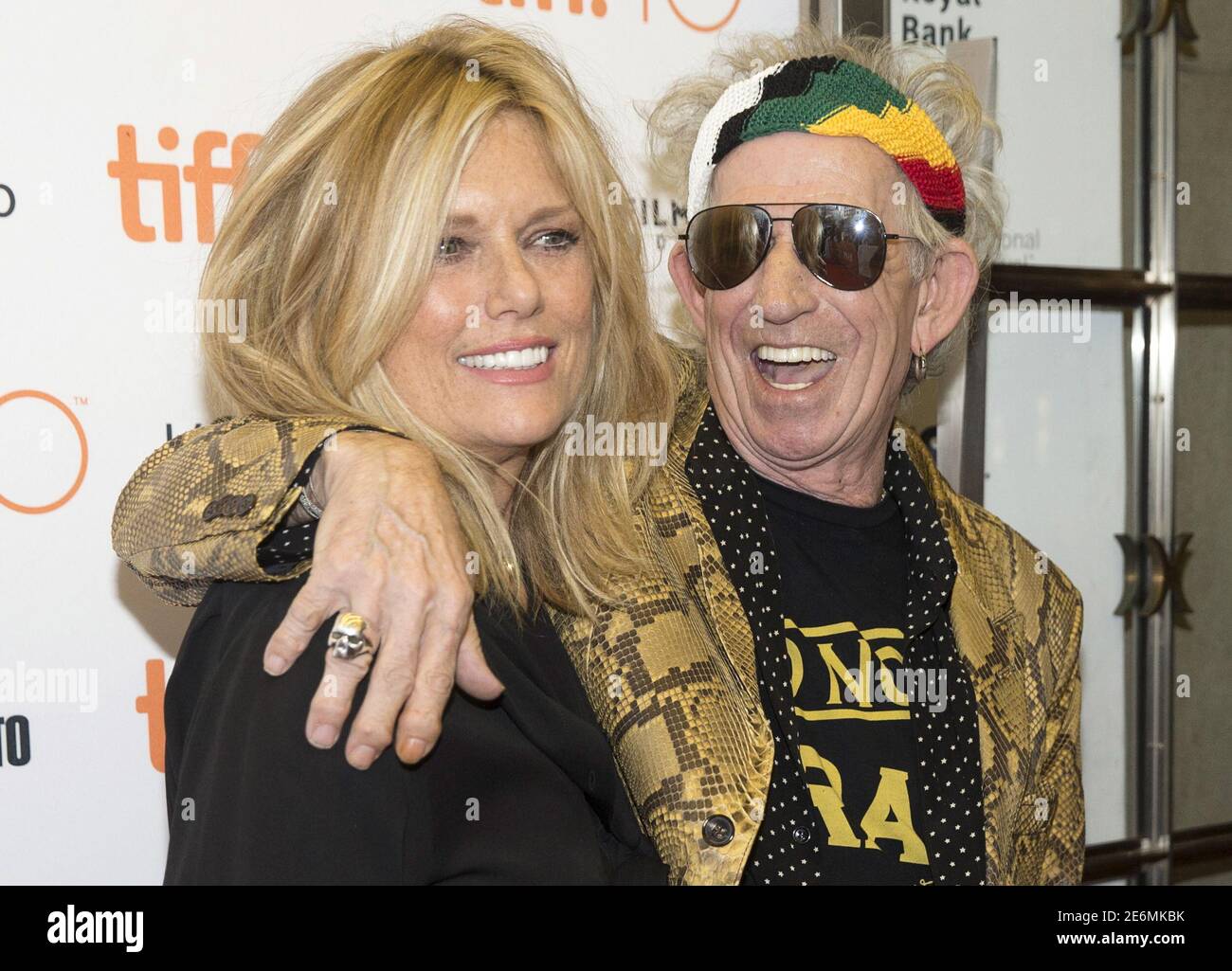 Rolling Stones guitarist Keith Richards arrives with his wife Patti Hansen  on the red carpet for the film "Keith Richards: Under the Influence" during  the 40th Toronto International Film Festival in Toronto,
