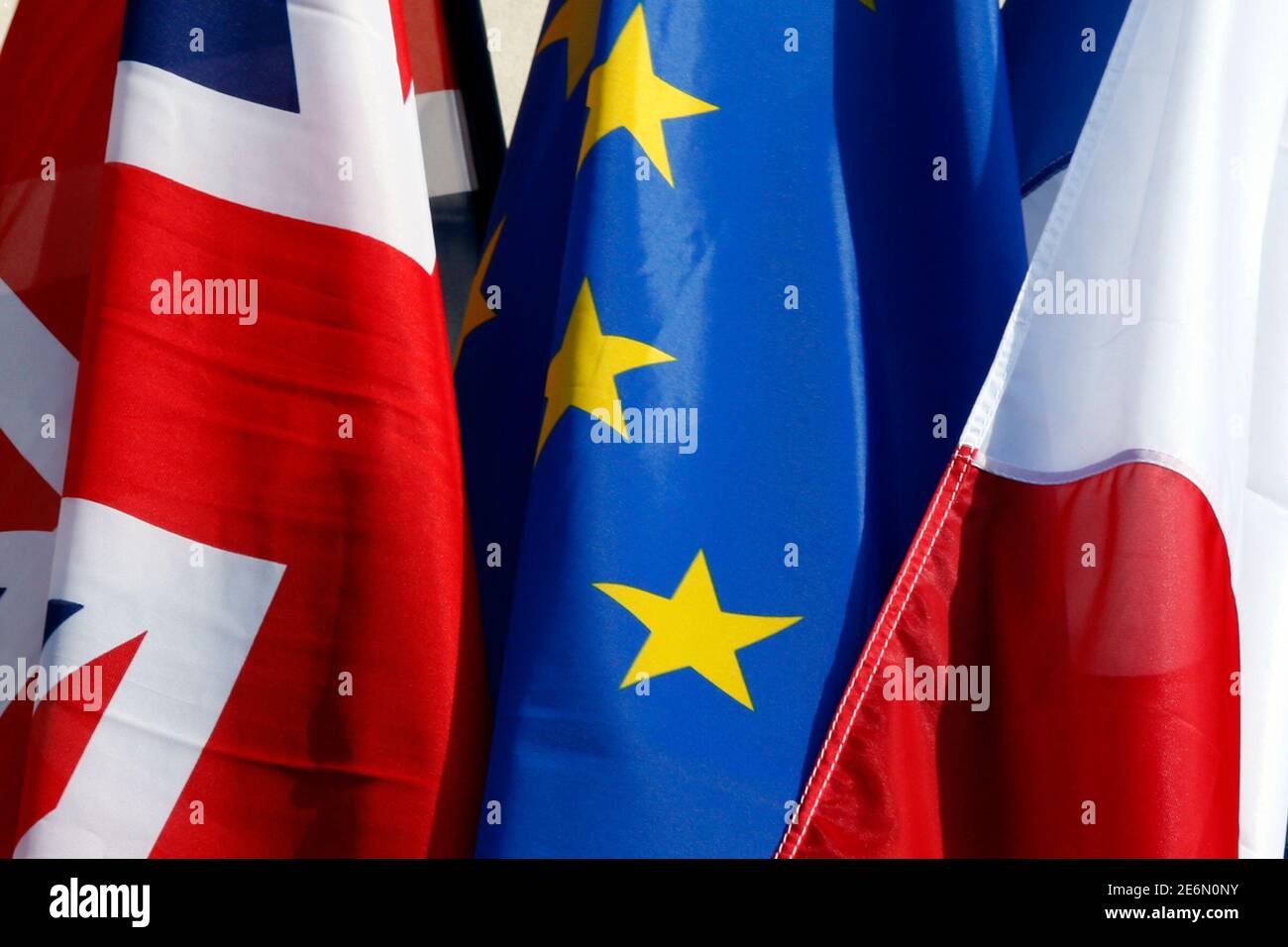 French flag, British Union Jack flag and European flag fly on the Amiens city hall during a Franco-Britain summit in Amiens, northern France, March 3, 2016. REUTERS/Philippe Wojazer Stock Photo