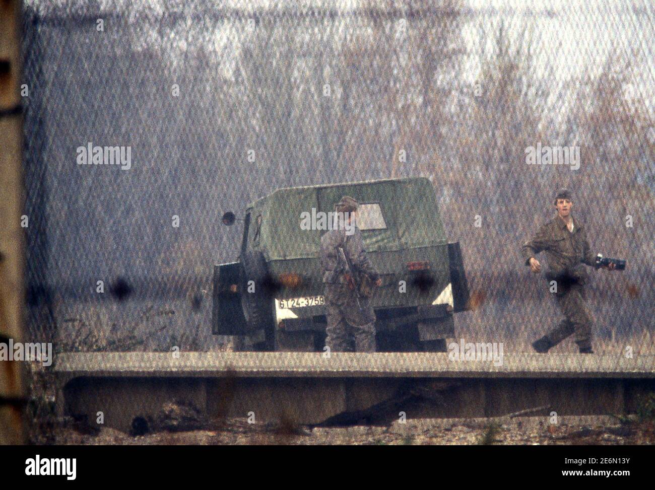 East German Boarder guards on the Iron Curtain boarder between East and West Germany near Brunswick 1983 Stock Photo