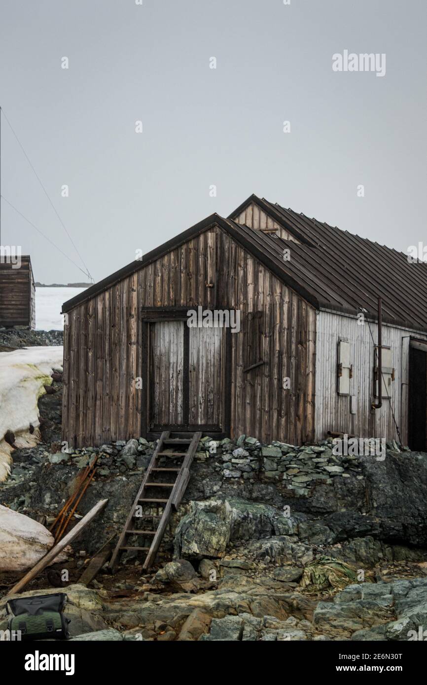 Abandoned wooden huts at British Base W, Detaille Island, Antarctica Stock Photo