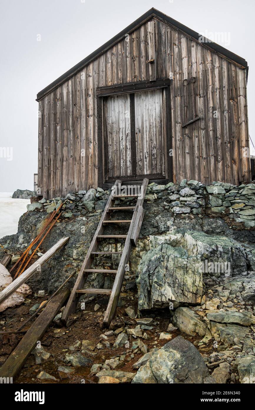 Abandoned wooden huts at British Base W, Detaille Island, Antarctica Stock Photo