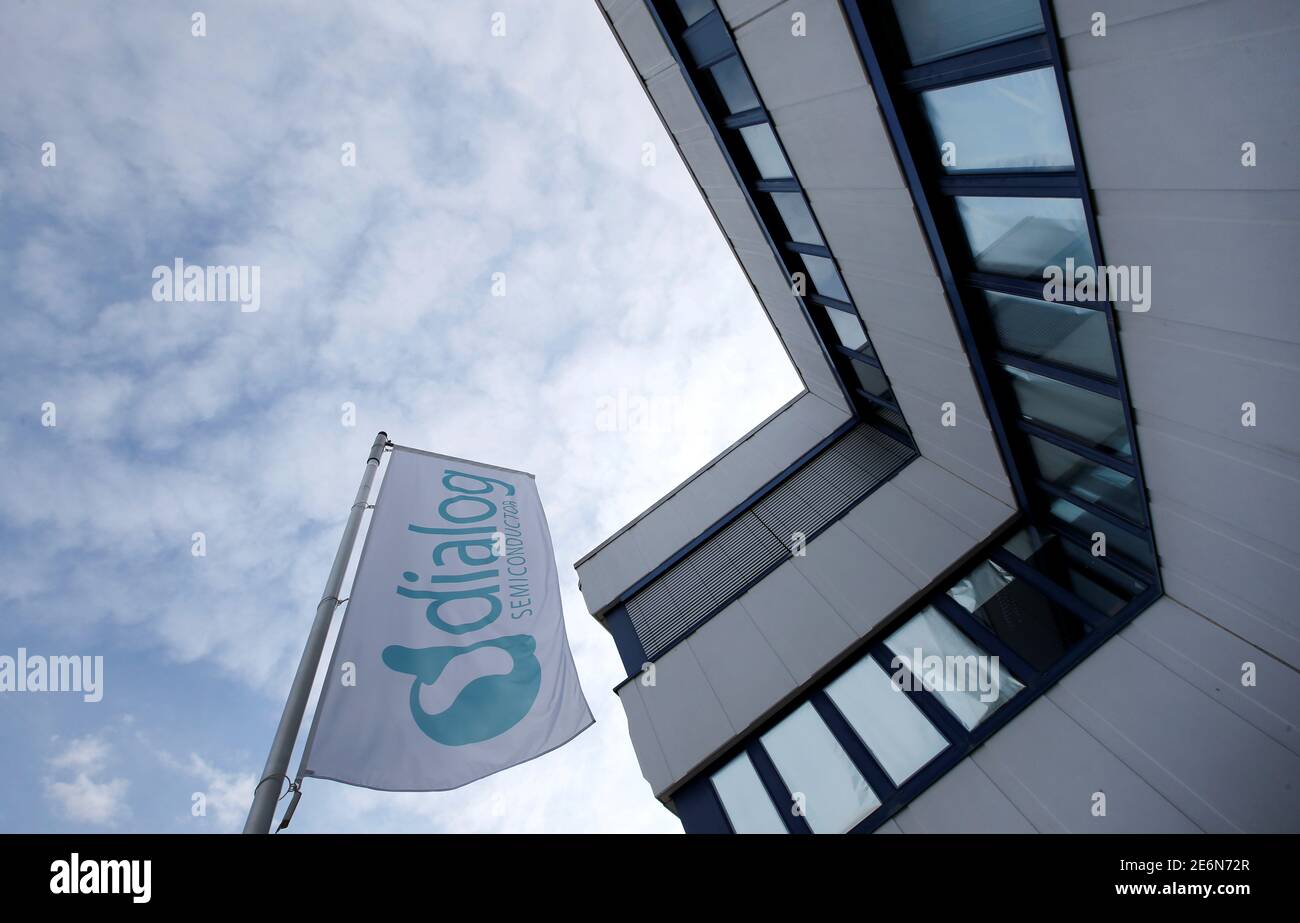 Dialog semiconductor logo is pictured at a flag in Germering near Munich, Germany August 15, 2016. REUTERS/Michaela Rehle Stock Photo