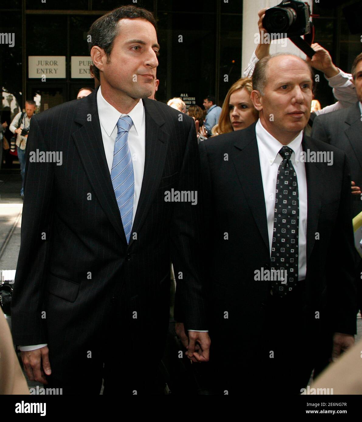 Defendant Howard K. Stern (L), long-time attorney and partner of late entertainment celebrity Anna Nicole Smith and his lawyer Steven H. Sadow (R) leave the Los Angeles County Criminal Courts building after Stern's arraignment in Los Angeles, California, May 13, 2009. The longtime companion of Anna Nicole Smith and two psychiatrists were charged on Thursday with conspiring to furnish drugs to the former Playboy playmate in the years before her 2007 death from a prescription medication overdose.   REUTERS/Danny Moloshok (UNITED STATES CRIME LAW ENTERTAINMENT) Stock Photo